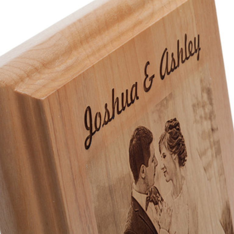 "A beautifully crafted personalized wood plaque with intricate engraving, perfect for commemorating milestones."